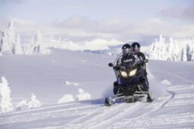 Yukon Wilderness: Snowmobiles & Northern Lights