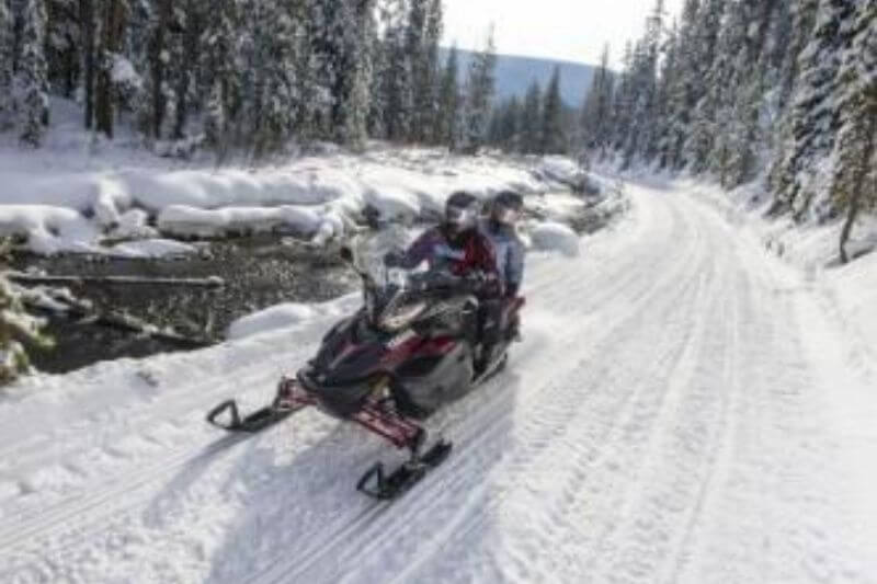Yukon Wilderness: Snowmobiles & Northern Lights