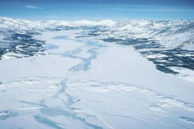 Yukon Wilderness: Snowmobiles & Northern Lights